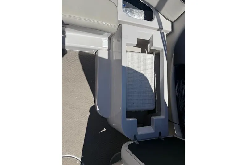 Slide: The Image of Interior view of a 2002 Four Winns 220 Horizon boat showing storage compartment. - 8