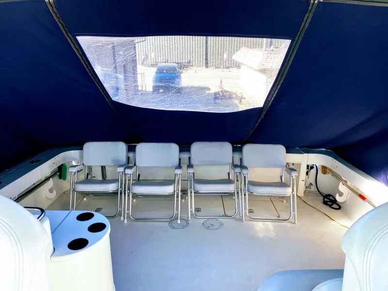 Slide: The Image of Interior of 1999 Sea Ray 370 Express Cruiser with seating area. - 20