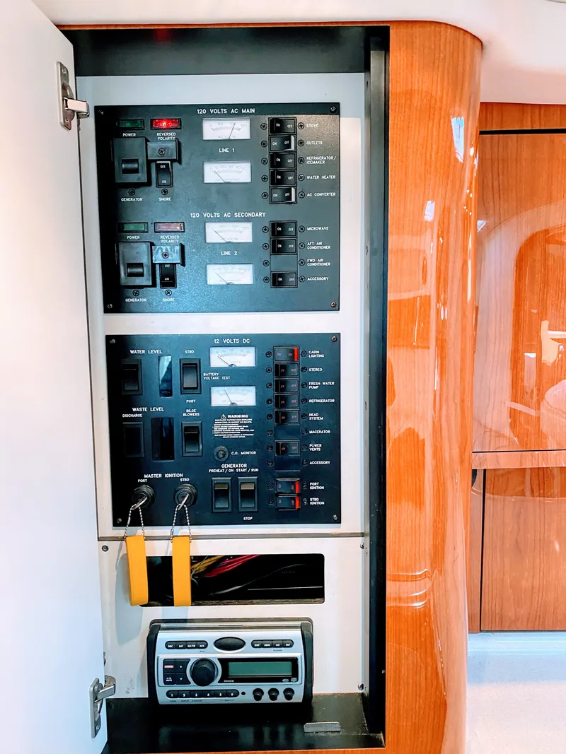 Slide: The Image of Electrical panel of 1999 Sea Ray 370 Express Cruiser. - 32