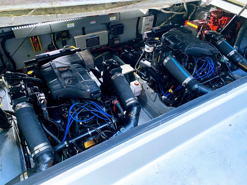 Slide: The Image of Engine compartment of 1999 Sea Ray 370 Express Cruiser. - 44