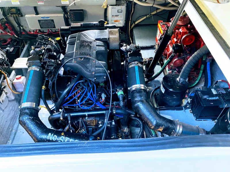 Slide: The Image of Engine compartment of a 1999 Sea Ray 370 Express Cruiser boat. - 46