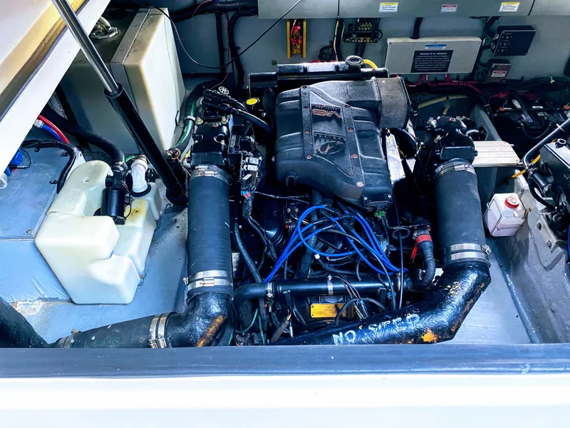 Slide: The Image of Engine compartment of a 1999 Sea Ray 370 Express Cruiser boat. - 47