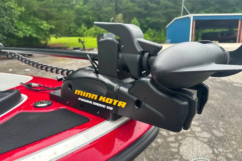 Slide: The Image of Minn Kota Power Drive V2 on 2017 Nitro Z19 Sport boat, parked outdoors. - 4
