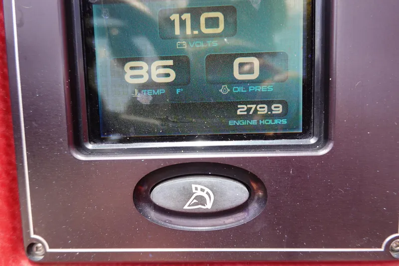 Slide: The Image of Centurion Enzo SV244 2013 dashboard display showing voltage, temperature, oil pressure, and engine hours. - 13