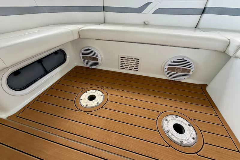 Slide: The Image of Interior of 2006 Formula 400 Super Sport boat with teak flooring and built-in speakers. - 10