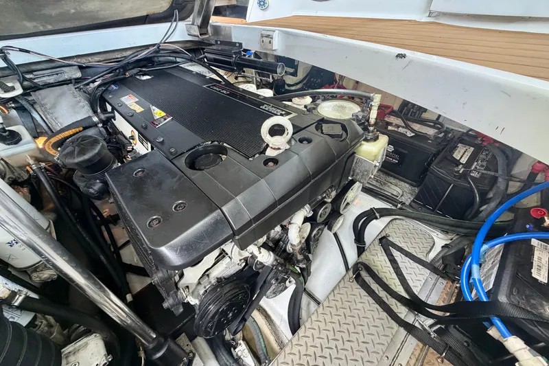 Slide: The Image of Engine compartment of a 2006 Formula 400 Super Sport boat, showcasing detailed components. - 26