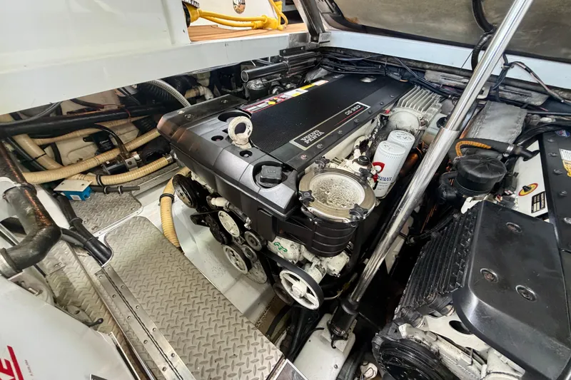 Slide: The Image of Engine compartment of a 2006 Formula 400 Super Sport boat, showcasing mechanical components. - 27