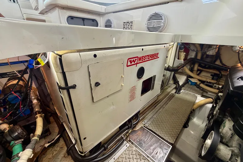 Slide: The Image of Engine room of 2006 Formula 400 Super Sport with Westerbeke generator. - 28