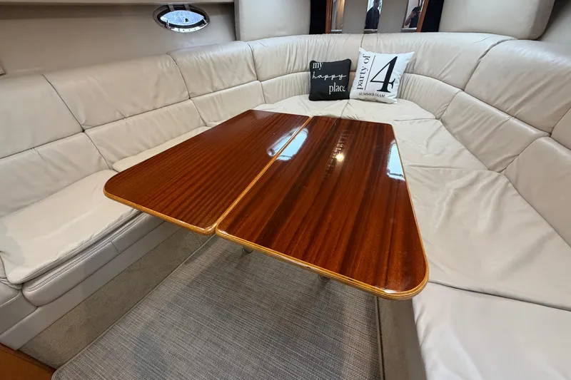 Slide: The Image of Luxurious interior of a 2006 Formula 400 Super Sport yacht with elegant wood table. - 38