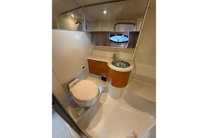 Slide: The Image of Bathroom interior of 2006 Formula 400 Super Sport yacht, featuring toilet and sink. - 39