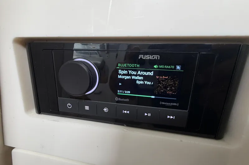Slide: The Image of Fusion stereo system on a 2006 Formula 400 Super Sport boat, playing music via Bluetooth. - 44