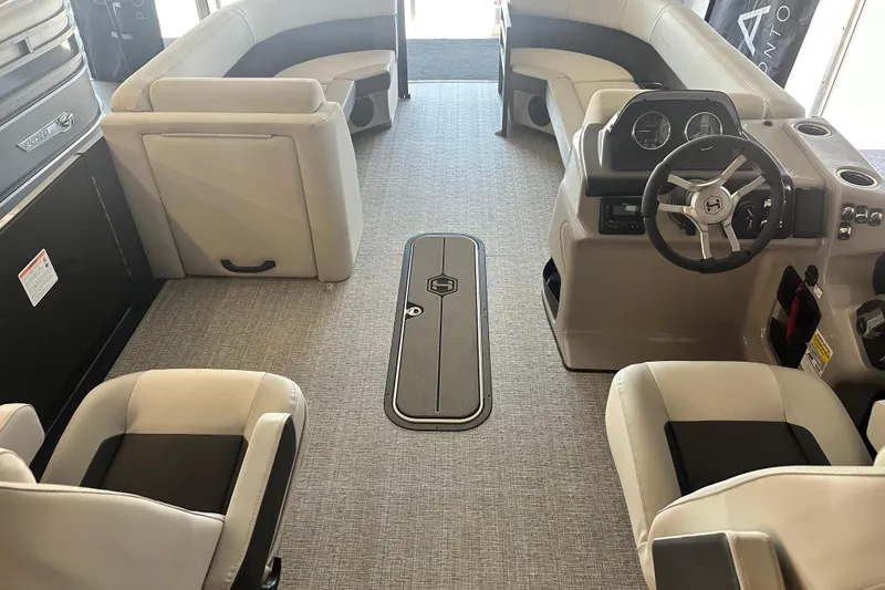 Slide: The Image of Interior of 2026 Harris Cruiser 230 SLDH pontoon boat with modern seating and helm. - 6