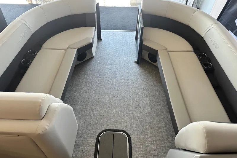 Slide: The Image of Interior seating of 2026 Harris Cruiser 230 SLDH pontoon boat with cup holders. - 8