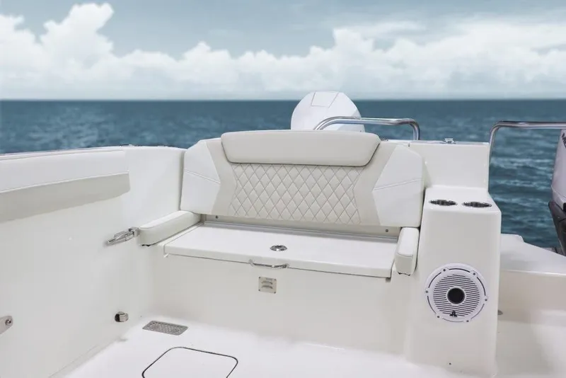 Slide: The Image of Manufacturer Provided Image: 2026 World Cat 325 DC boat interior with cushioned seating and ocean view. - 10