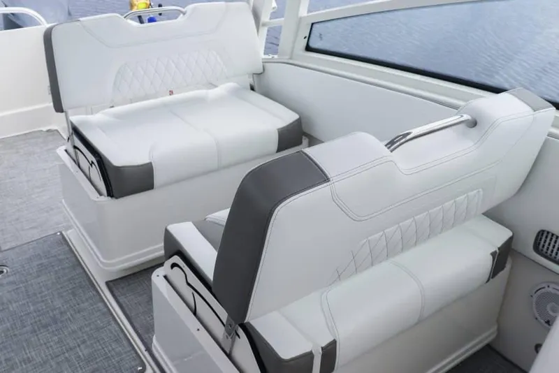 Slide: The Image of Manufacturer Provided Image: 2026 World Cat 325 DC boat interior with white and gray seating. - 7