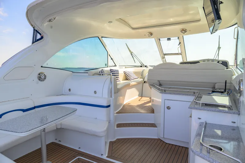 Slide: The Image of Luxurious interior of a 2010 Formula 45 Yacht with modern seating and amenities. - 12