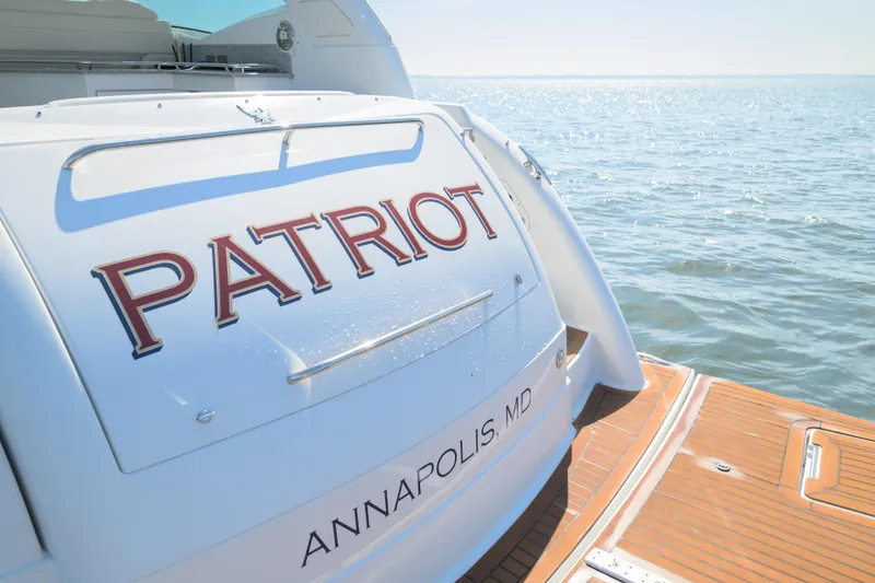 Slide: The Image of 2010 Formula 45 Yacht "Patriot" docked in Annapolis, MD, with ocean view. - 15
