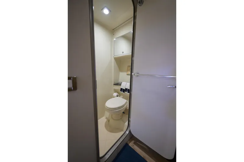 Slide: The Image of Bathroom interior of 2010 Formula 45 Yacht, featuring modern fixtures and compact design. - 18