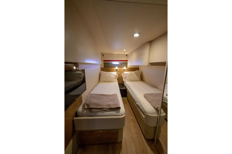 Slide: The Image of Interior cabin of 2010 Formula 45 Yacht with twin beds and modern decor. - 21