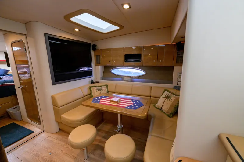 Slide: The Image of Interior of 2010 Formula 45 Yacht with cozy seating and modern amenities. - 26