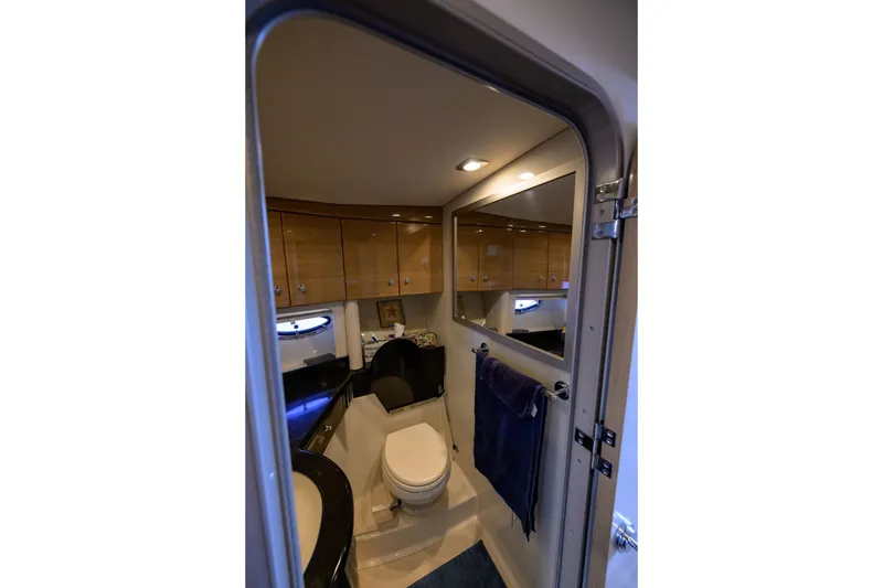 Slide: The Image of Luxurious bathroom interior of 2010 Formula 45 Yacht with modern fixtures and wooden cabinetry. - 30