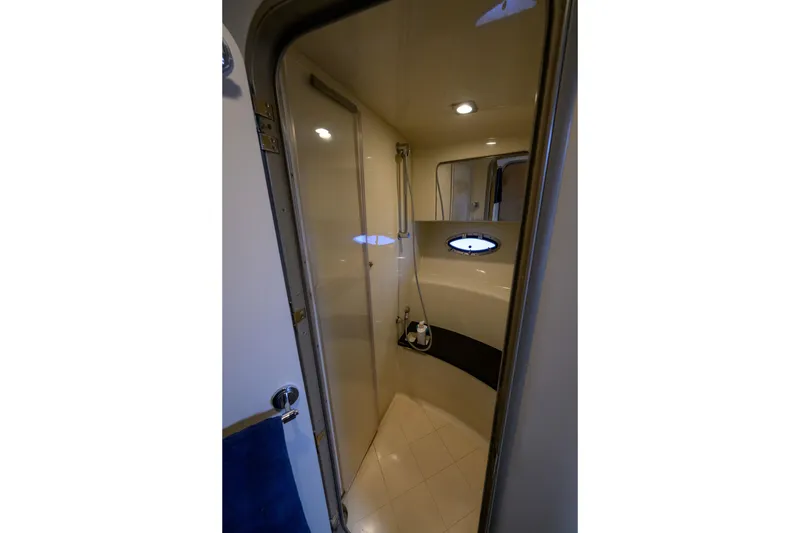 Slide: The Image of Interior view of 2010 Formula 45 Yacht bathroom with shower and porthole window. - 34