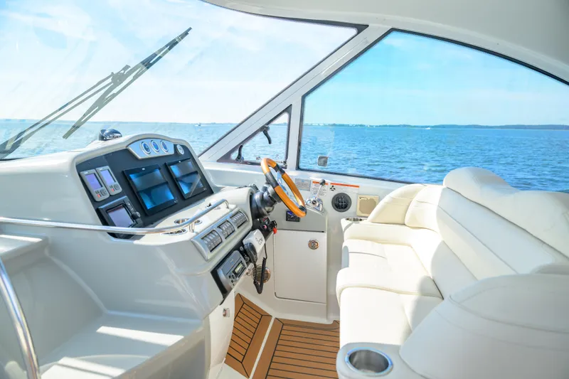 Slide: The Image of Interior view of 2010 Formula 45 Yacht cockpit with ocean backdrop. - 7
