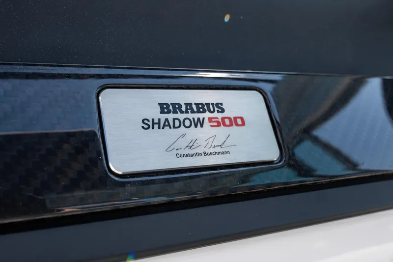 Slide: The Image of 2024 BRABUS Shadow 500 Cabin Wet Bar nameplate with signature detail. - 17