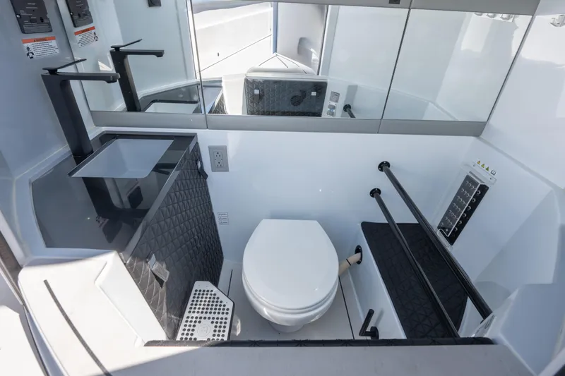 Slide: The Image of 2024 BRABUS Shadow 500 Cabin Wet Bar bathroom with modern fixtures and sleek design. - 16