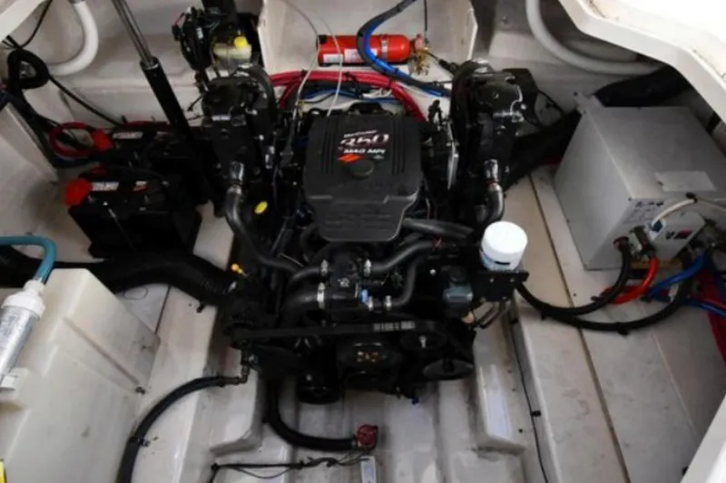 Slide: The Image of Engine compartment of a 2006 Sea Ray Sundancer 260 boat, featuring a 260 horsepower engine. - 7