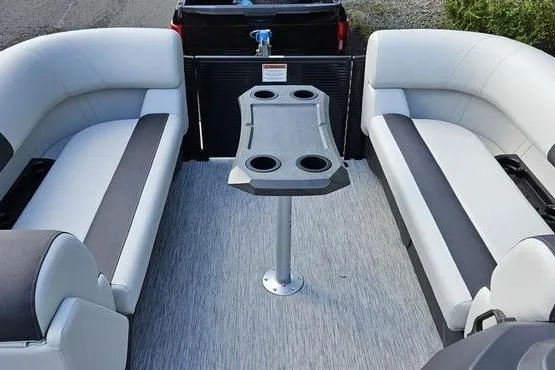 Slide: The Image of 2026 Bennington 22 SSR pontoon boat interior with seating and table. - 14