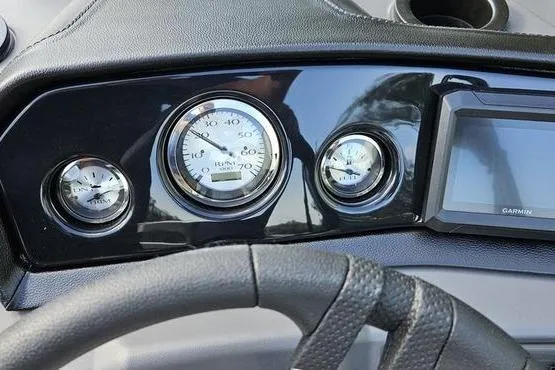 Slide: The Image of Dashboard of a 2026 Bennington 22 SSR boat with gauges and Garmin display. - 7