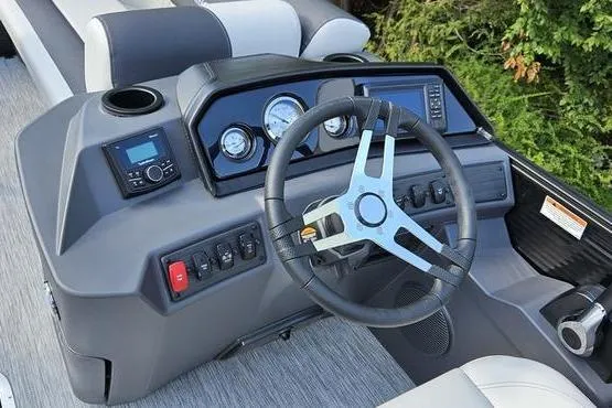 Slide: The Image of Steering console of 2026 Bennington 22 SSR boat with modern controls and gauges. - 8