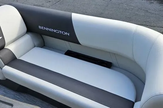 Slide: The Image of 2026 Bennington 22 SSR boat seat with sleek black and white upholstery. - 9