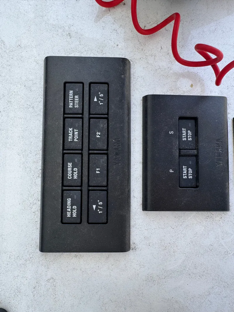 Slide: The Image of Yamaha control buttons on Sea Hunt Gamefish 25, 2024 model. - 13