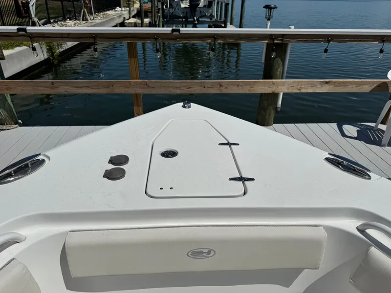 Slide: The Image of 2024 Sea Hunt Gamefish 25 boat deck at dock. - 17