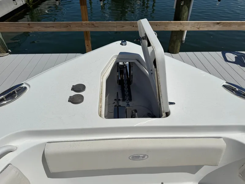 Slide: The Image of 2024 Sea Hunt Gamefish 25 anchor compartment at dock. - 19