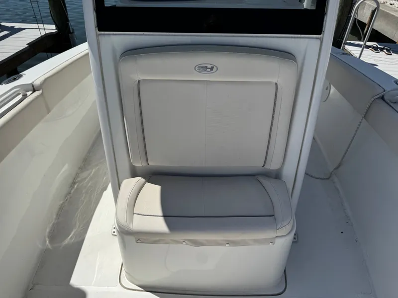 Slide: The Image of 2024 Sea Hunt Gamefish 25 seating area on a boat. - 20
