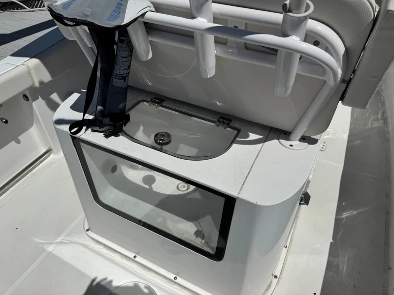 Slide: The Image of 2024 Sea Hunt Gamefish 25 boat with fishing rod holder and storage. - 24
