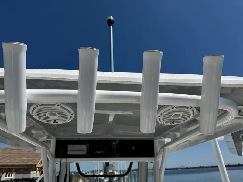 Slide: The Image of 2024 Sea Hunt Gamefish 25 with rod holders and speakers. - 27