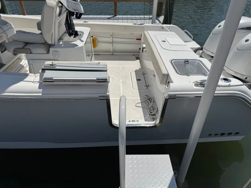 Slide: The Image of 2024 Sea Hunt Gamefish 25 boat dock with engines. - 36