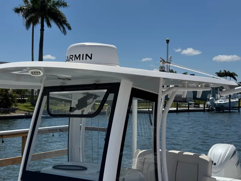Slide: The Image of 2024 Sea Hunt Gamefish 25 with Garmin equipment at the dock. - 47