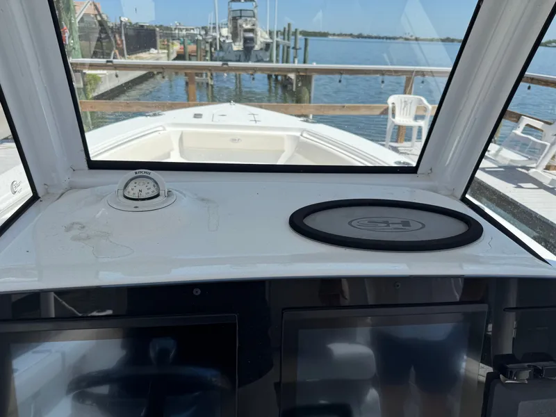 Slide: The Image of Interior view of a 2024 Sea Hunt Gamefish 25 boat at dock. - 9