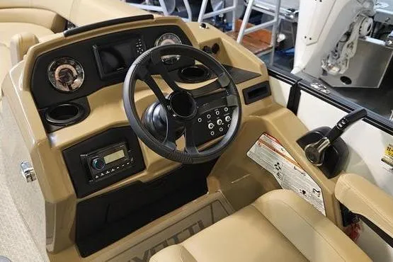 Slide: The Image of Interior view of 2026 Evotti 521QL boat dashboard with steering wheel and controls. - 6