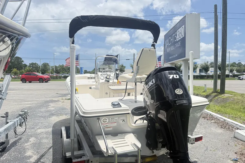 Slide: The Image of 2023 Carolina Skiff 162 JLS boat with Suzuki 70 engine at dealership. - 3