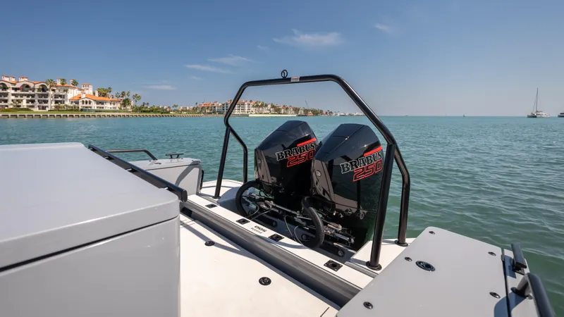Slide: The Image of 2023 BRABUS Shadow 500 T-Top boat with dual engines on a sunny day. - 22