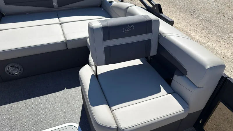 Slide: The Image of Interior of Barletta C22U boat, 2025 model, featuring gray upholstery. - 15