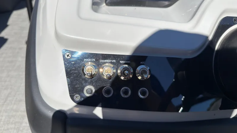 Slide: The Image of Control panel of 2025 Barletta C22U with light switches. - 20