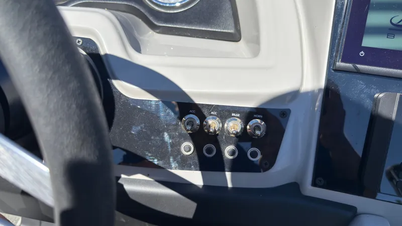 Slide: The Image of Dashboard of a 2025 Barletta C22U boat. - 21