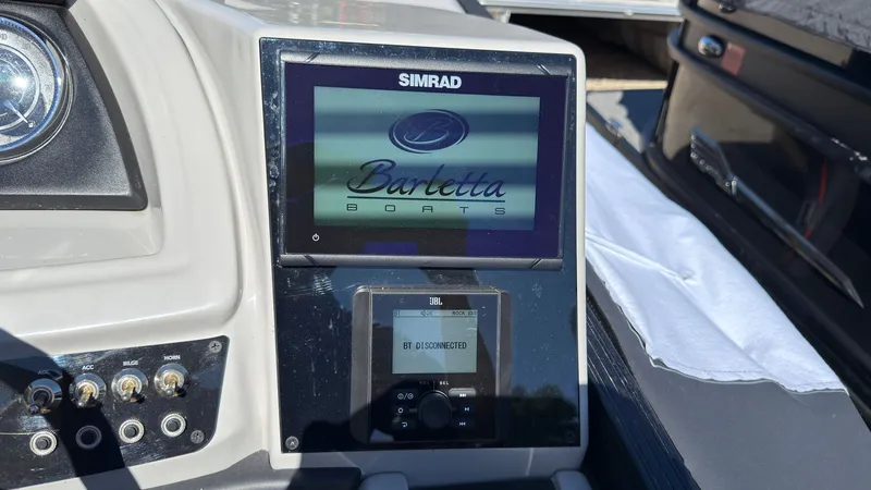 Slide: The Image of Barletta C22U 2025 boat console with Simrad display. - 22